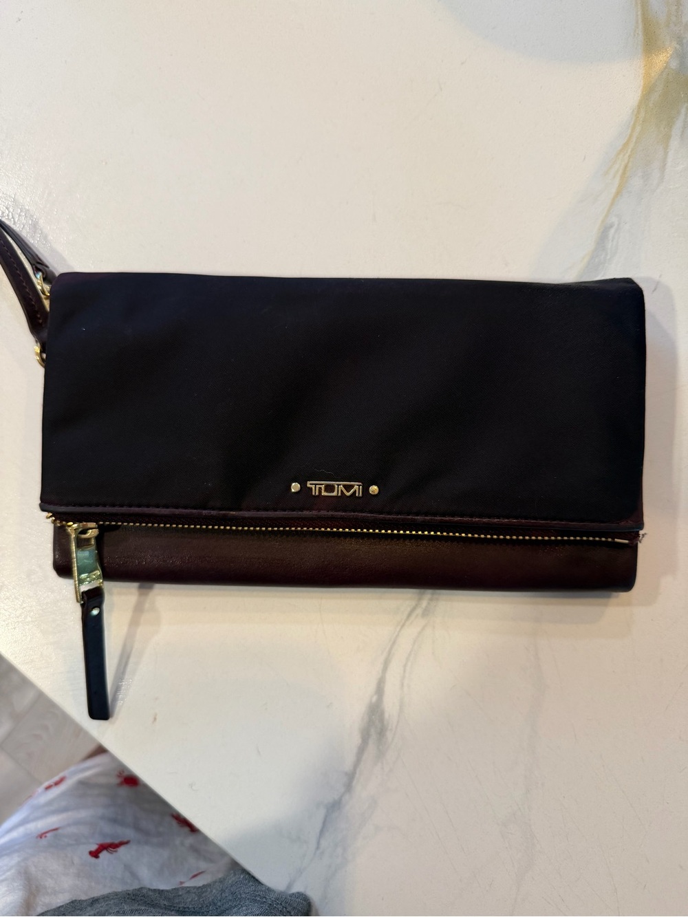 Tumi Wine and Fold-Over Wristlet Clutch